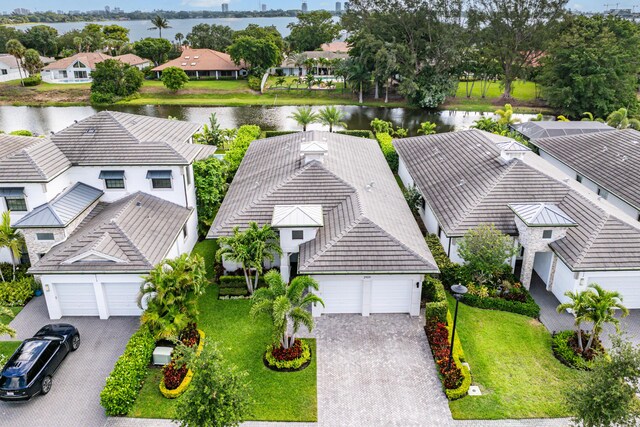 aerial view of residential area with a nearby body of water