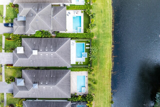 drone / aerial view of a pool
