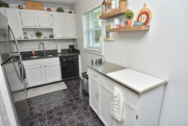 kitchen with a sink, marble finish floor, freestanding refrigerator, open shelves, and dishwasher