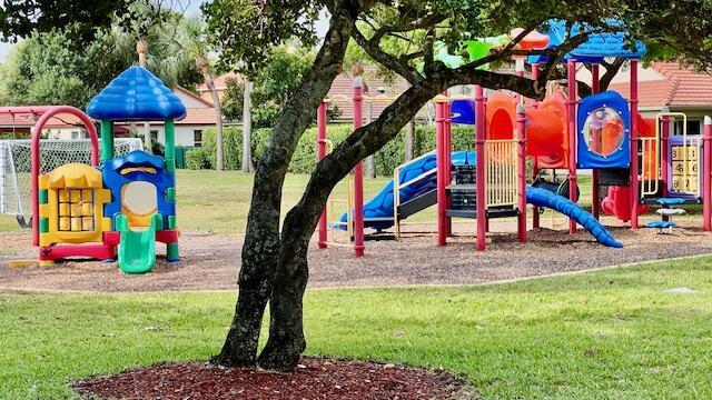 7026 Galleon Cv, Riviera Beach, FL 33418 - community playground with a yard