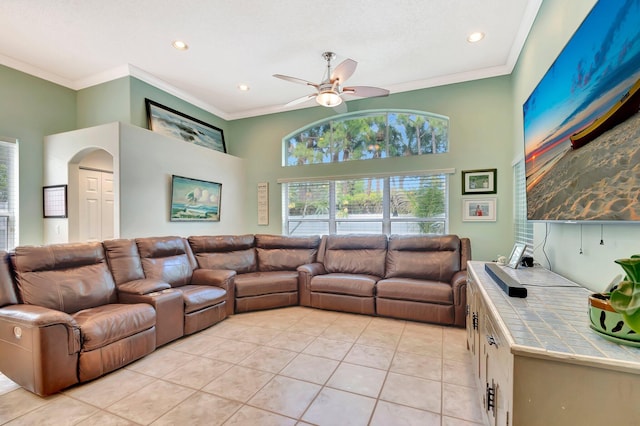 living room featuring crown molding, light tile patterned floors, ceiling fan, and recessed lighting