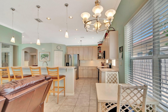 dining area with light tile patterned flooring, visible vents, recessed lighting, a chandelier, and arched walkways