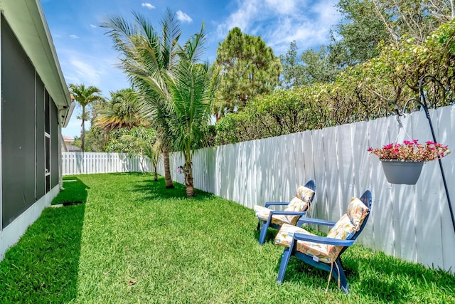 view of yard featuring a fenced backyard