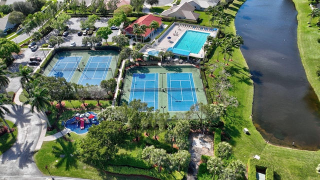 bird's eye view with a water view