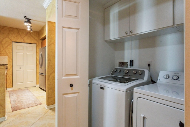 625 Casa Loma Blvd Unit 1103, Boynton Beach, FL 33435 - laundry room featuring cabinet space, independent washer and dryer, and light tile patterned floors
