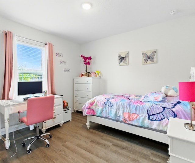 3020 SW Ann Arbor Rd, Port Saint Lucie, FL 34953 - bedroom featuring wood finished floors