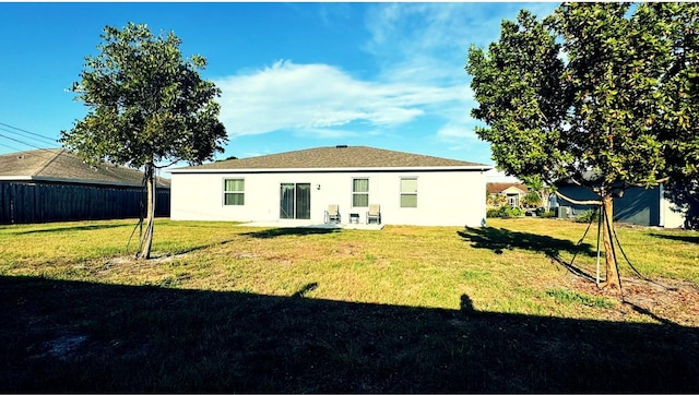3020 SW Ann Arbor Rd, Port Saint Lucie, FL 34953 - rear view of house with stucco siding