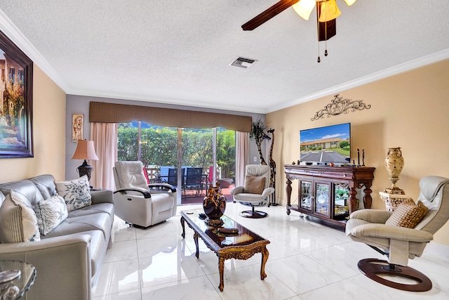 living area featuring crown molding, a textured ceiling, visible vents, and marble finish floor