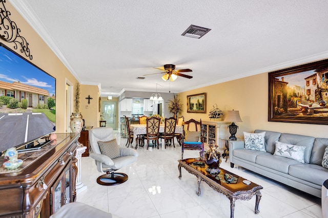 living room with a textured ceiling, visible vents, a ceiling fan, and ornamental molding