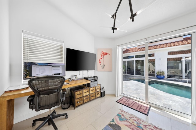 office space featuring baseboards
