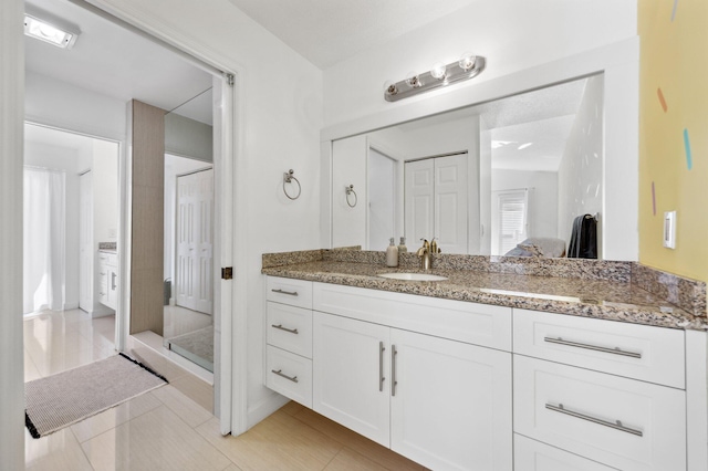 full bath featuring vanity