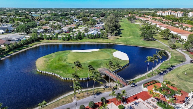 bird's eye view featuring a residential view, view of golf course, and a water view