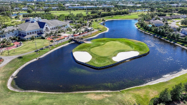 aerial view featuring a water view and view of golf course