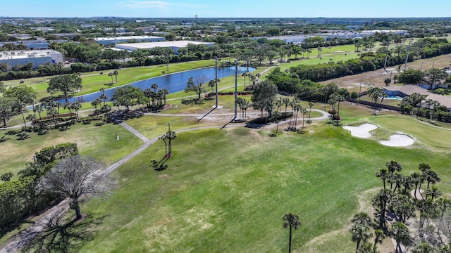 birds eye view of property featuring a water view and golf course view