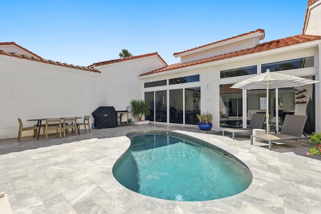 pool with a patio