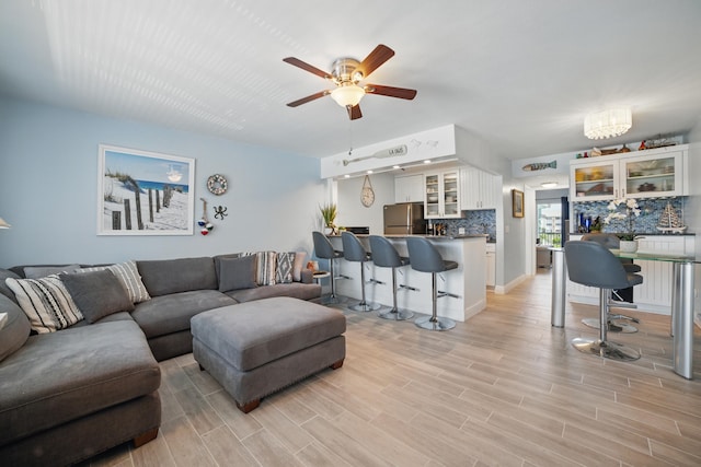 111 Doolen Ct Unit 208, North Palm Beach, FL 33408 - living room featuring ceiling fan and light wood-type flooring