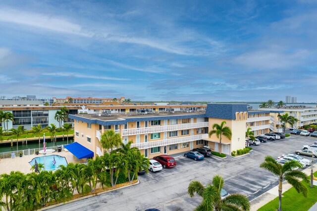 111 Doolen Ct Unit 208, North Palm Beach, FL 33408 - view of apartment building / complex featuring uncovered parking