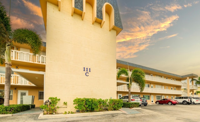 111 Doolen Ct Unit 208, North Palm Beach, FL 33408 - view of property with uncovered parking