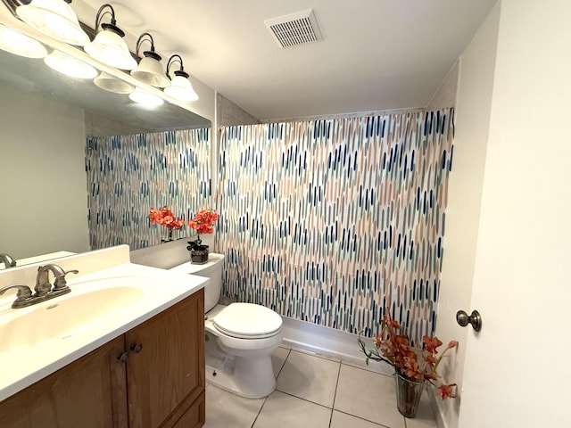 full bathroom featuring tile patterned flooring, vanity, toilet, and a shower with curtain