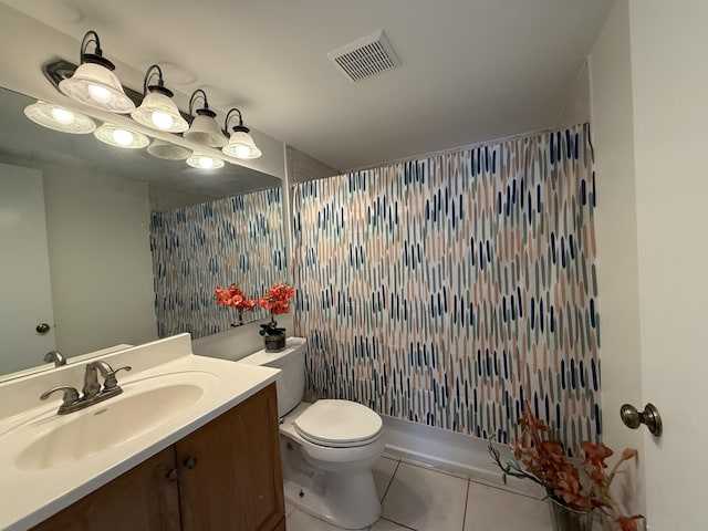 bathroom with tile patterned flooring, vanity, toilet, and a shower with curtain