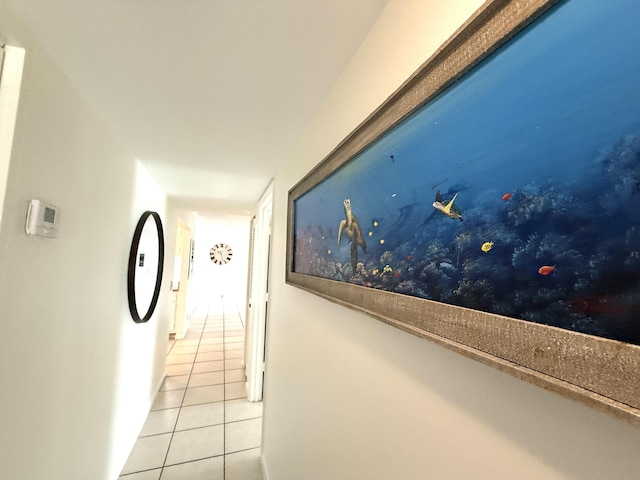 hallway featuring tile patterned flooring