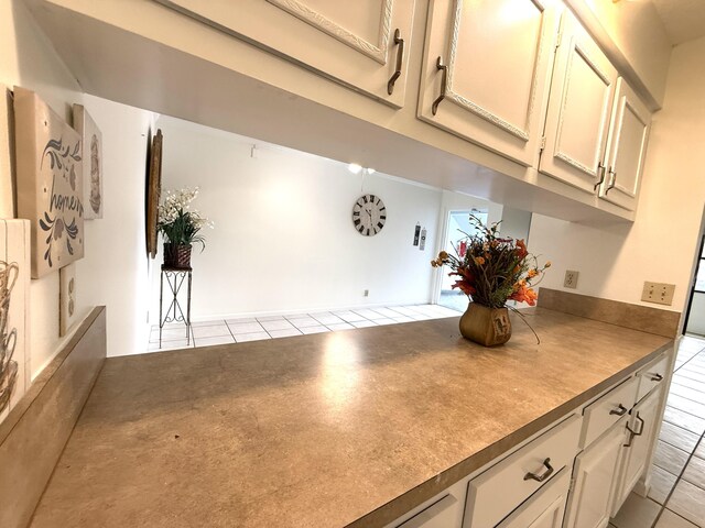 kitchen featuring light tile patterned flooring