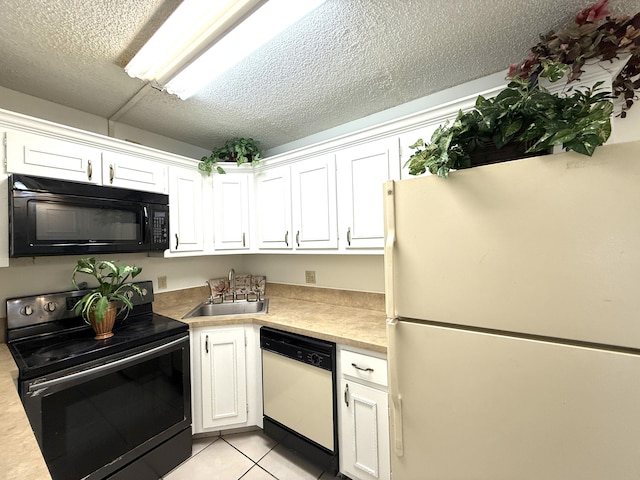 kitchen with black appliances, a sink, white cabinetry, light countertops, and a textured ceiling