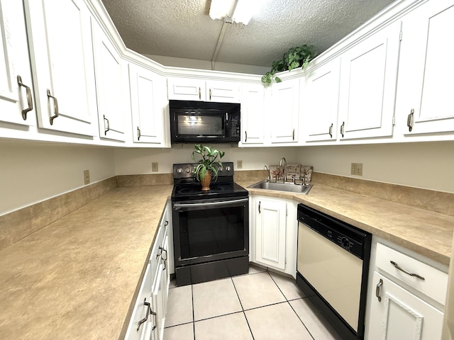 kitchen featuring black appliances, a sink, white cabinets, a textured ceiling, and light countertops