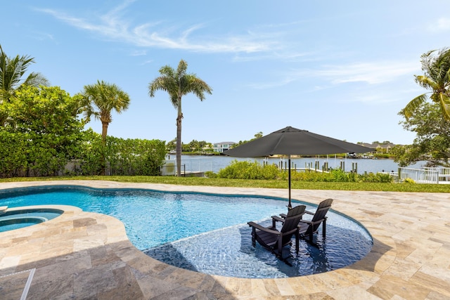 19100 SE County Line Rd, Jupiter, FL 33469 - view of swimming pool featuring a patio area and a pool with connected hot tub
