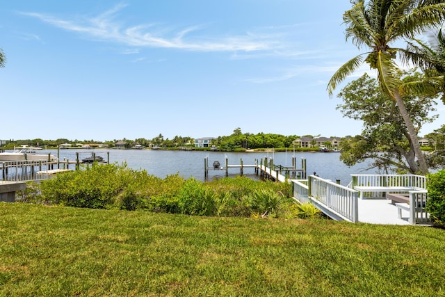 19100 SE County Line Rd, Jupiter, FL 33469 - dock area with a water view and a lawn