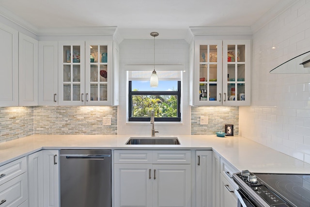 kitchen with light countertops, white cabinetry, a sink, and dishwasher