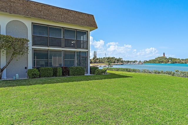view of yard with a water view