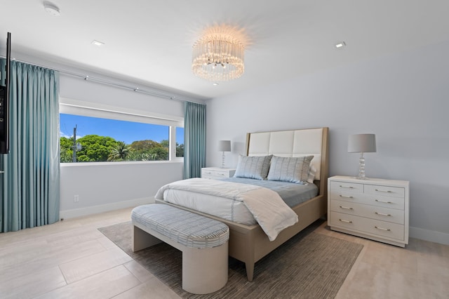 758 N St, West Palm Beach, FL 33401 - bedroom featuring a chandelier and baseboards