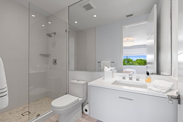 758 N St, West Palm Beach, FL 33401 - bathroom with a stall shower, toilet, vanity, wood finished floors, and recessed lighting