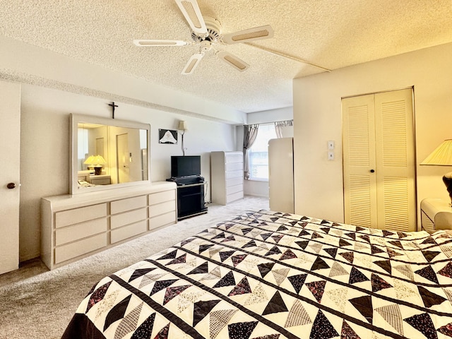 7145 Huntington Ln Unit 102, Delray Beach, FL 33446 - bedroom featuring a closet, a textured ceiling, ceiling fan, and carpet floors