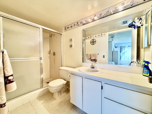 7145 Huntington Ln Unit 102, Delray Beach, FL 33446 - full bath featuring toilet, vanity, visible vents, tile patterned flooring, and a shower stall