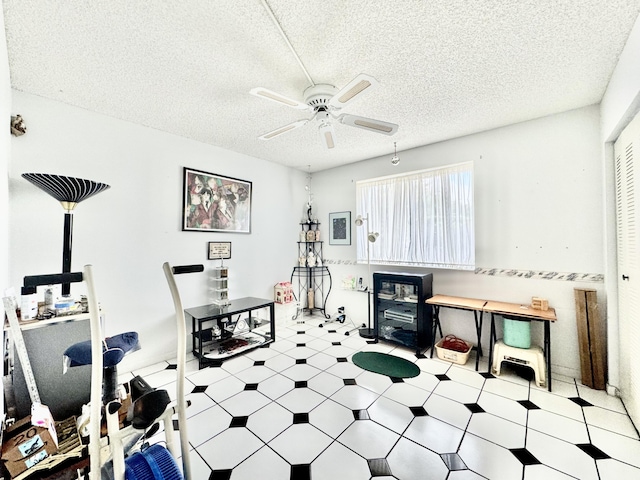 7145 Huntington Ln Unit 102, Delray Beach, FL 33446 - interior space featuring tile patterned floors, a textured ceiling, and ceiling fan