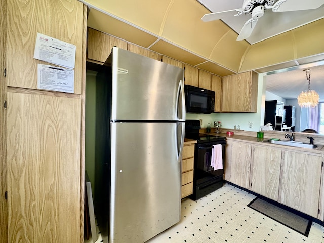 7145 Huntington Ln Unit 102, Delray Beach, FL 33446 - kitchen with light floors, light brown cabinetry, a sink, ceiling fan with notable chandelier, and black appliances