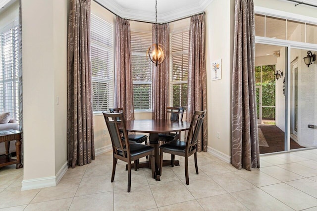 9481 Mcaneeny Ct, Wellington, FL 33414 - dining space featuring baseboards, a chandelier, crown molding, and light tile patterned floors