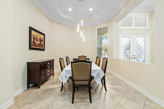 9481 Mcaneeny Ct, Wellington, FL 33414 - dining room with a tray ceiling, ornamental molding, baseboards, light tile patterned floors, and recessed lighting