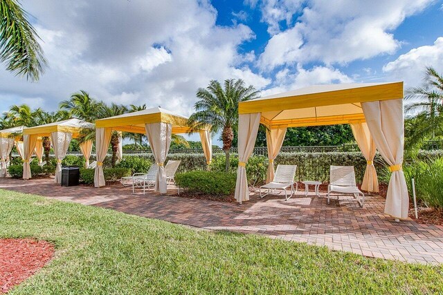9481 Mcaneeny Ct, Wellington, FL 33414 - view of yard featuring a gazebo and a patio area