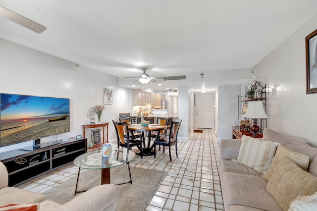 living room featuring ceiling fan