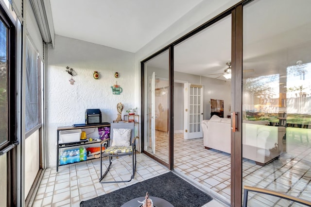 sunroom with plenty of natural light and french doors