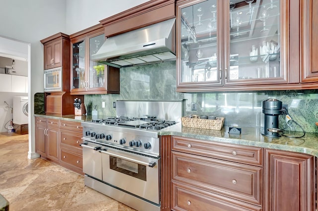 2393 NW 59th St, Boca Raton, FL 33496 - kitchen with ventilation hood, light stone countertops, tasteful backsplash, and appliances with stainless steel finishes