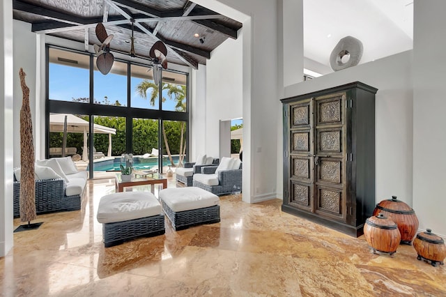 2393 NW 59th St, Boca Raton, FL 33496 - interior space with marble finish floor and a towering ceiling