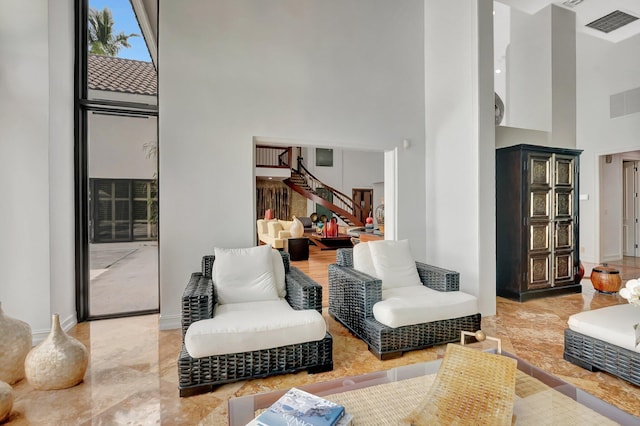 2393 NW 59th St, Boca Raton, FL 33496 - interior space with stairway, a high ceiling, baseboards, and visible vents