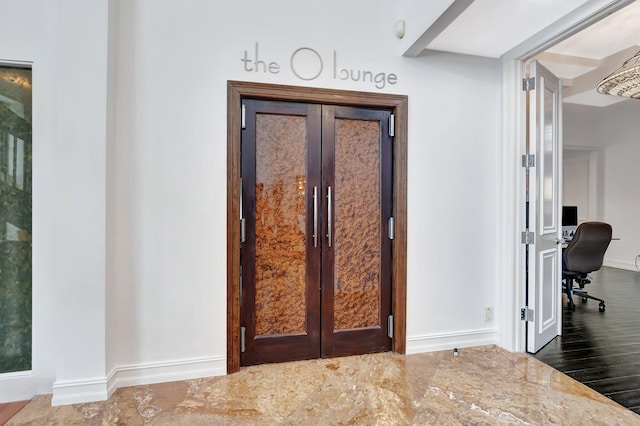 2393 NW 59th St, Boca Raton, FL 33496 - entryway with baseboards, french doors, and dark wood-type flooring