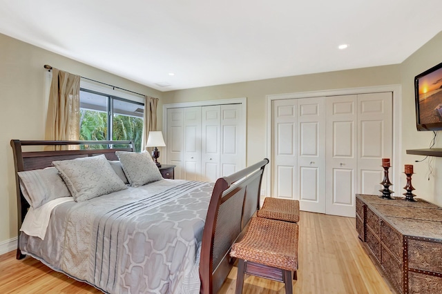 2393 NW 59th St, Boca Raton, FL 33496 - bedroom with light wood-style flooring, baseboards, multiple closets, and recessed lighting