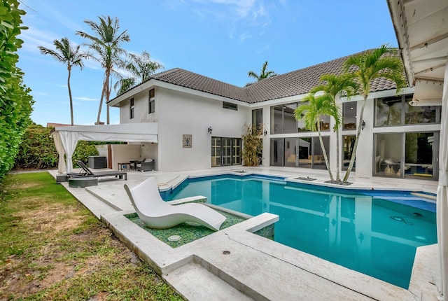 2393 NW 59th St, Boca Raton, FL 33496 - pool featuring a jacuzzi and a patio