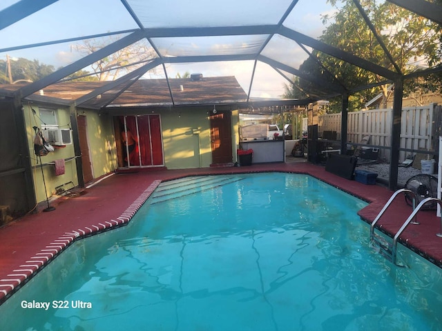 1441 W Central St, Lantana, FL 33462 - view of swimming pool featuring a patio, a lanai, and an outdoor kitchen
